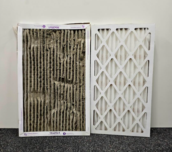 Photo of two furnace filters, the one on the left is very dirty and the one on the right is new and clean