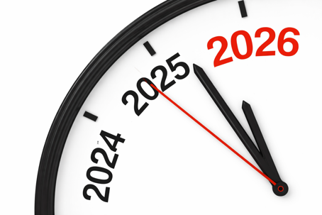 Photo of a clock but instead of usual numbers it has 2024, 2025 and 2026 ticking by