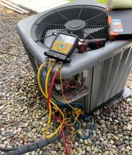 Air conditioner with diagnostic tool connected to it
